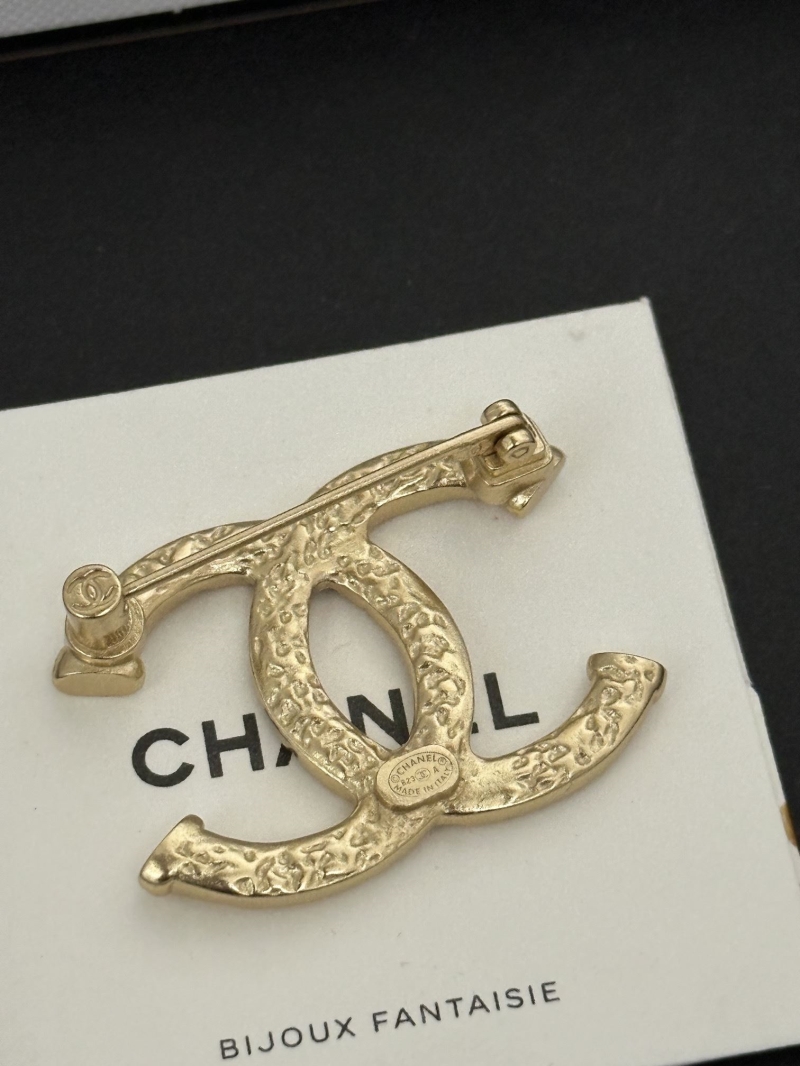 Ch**el brooches